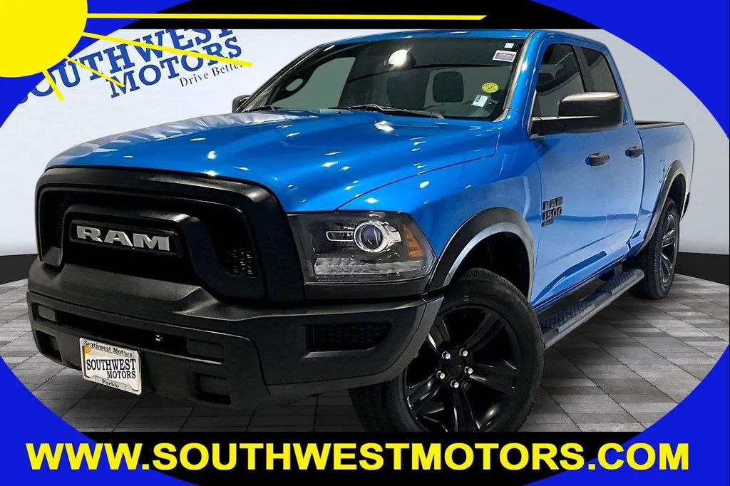 صورة 1 لـ 2022 RAM 1500 CLASSIC WARLOCK QUAD CAB 4X4 6'4' BOX