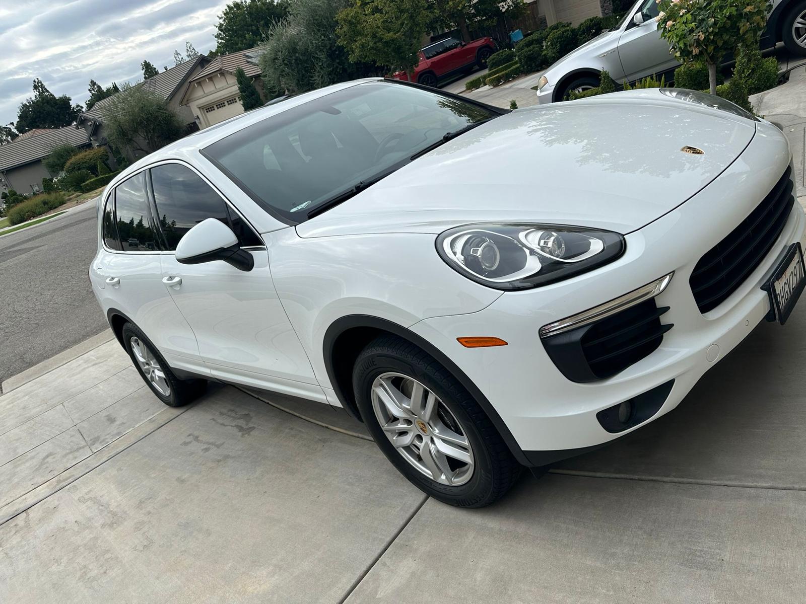 The pre-owned 2019 Porsche Cayenne in Biscay Blue Metallic available at  Porsche Fresno 🔥 Mileage: 21,824 Price: $63,999 . Want to lea