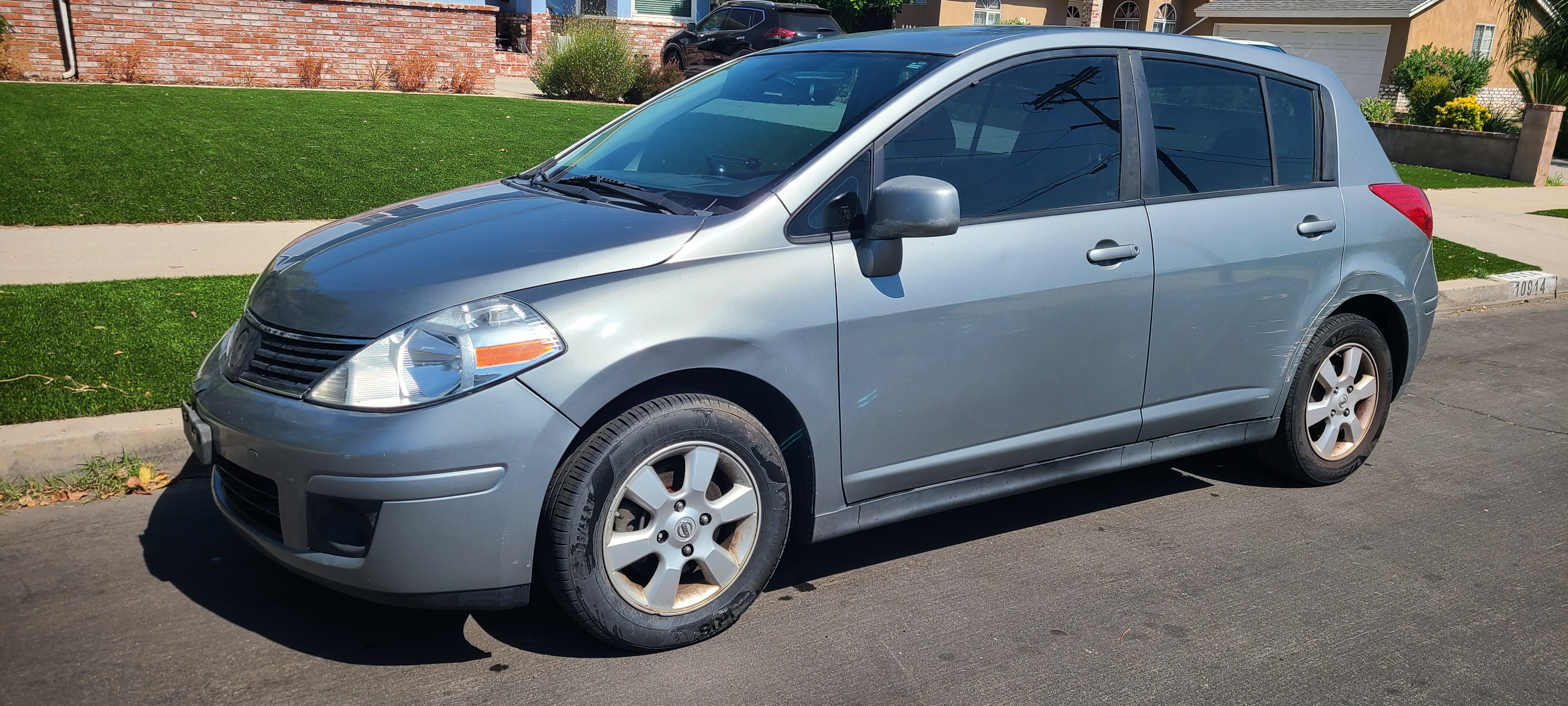 used nissan versa hatchback under 5000