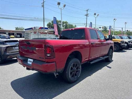 Molten Red Pearlcoat 2026 RAM 2500 Black Express Crew Cab 4x4 6'4' Box