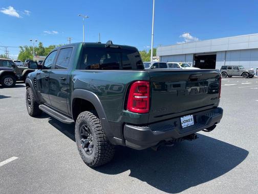 Serrano Green Metallic 2026 RAM 1500 RHO Crew Cab 4x4 5'7' Box