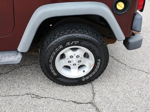 Maroon 2002 Jeep Wrangler Sport