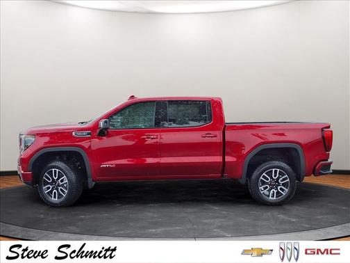 Volcanic Red Tintcoat 2026 GMC Sierra 1500 AT4