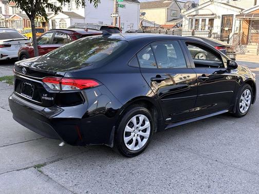 Midnight Black Metallic 2023 Toyota Corolla Hybrid LE
