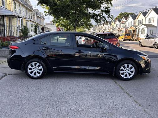 Midnight Black Metallic 2023 Toyota Corolla Hybrid LE