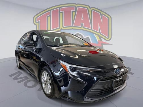 Midnight Black Metallic 2025 Toyota Corolla Hybrid LE