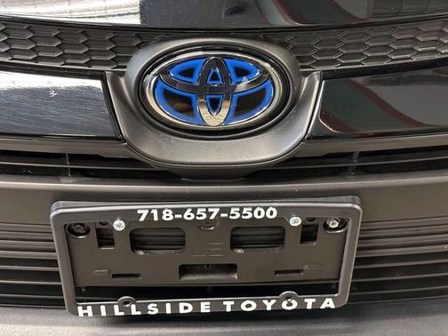 Midnight Black Metallic 2025 Toyota Corolla Hybrid LE