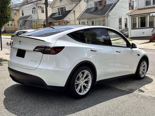 Pearl White Multi-Coat 2024 Tesla Model Y Long Range Dual Motor All-Wheel Drive