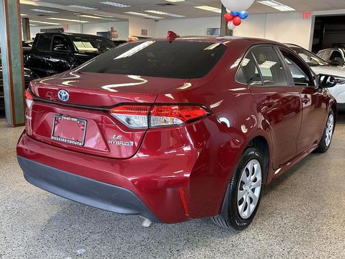 Ruby Flare Pearl 2023 Toyota Corolla Hybrid LE