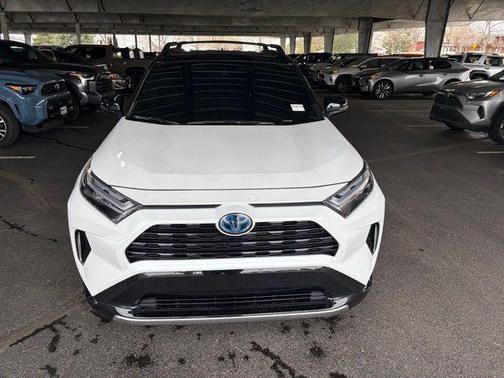 Wind Chill Pearl/Midnight Black Metallic 2024 Toyota RAV4 Hybrid SE