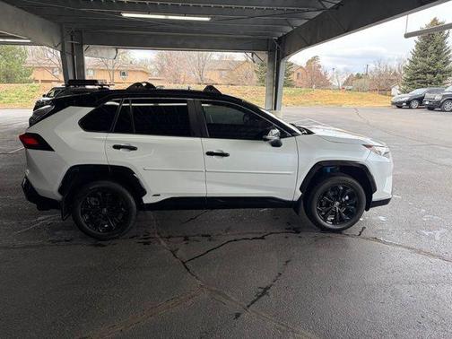 Wind Chill Pearl/Midnight Black Metallic 2024 Toyota RAV4 Hybrid SE