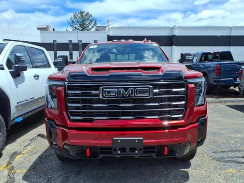 Volcanic Red Tintcoat 2026 GMC Sierra 2500 AT4