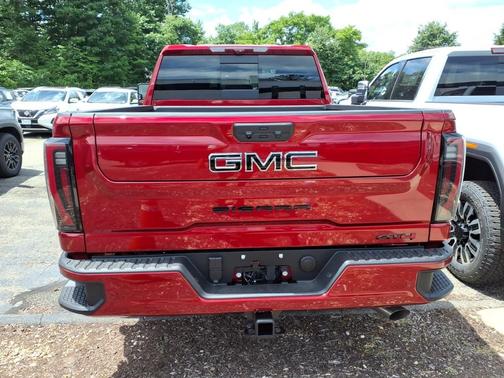 Volcanic Red Tintcoat 2026 GMC Sierra 2500 AT4