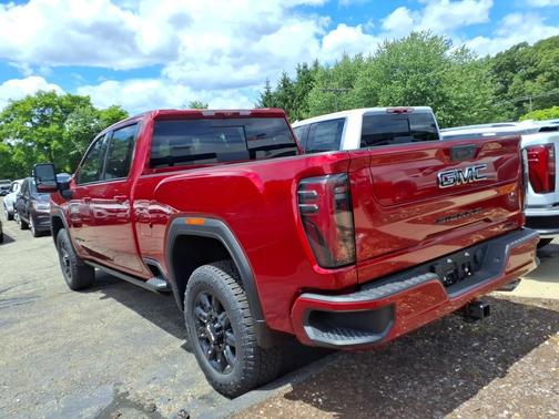 Volcanic Red Tintcoat 2026 GMC Sierra 2500 AT4