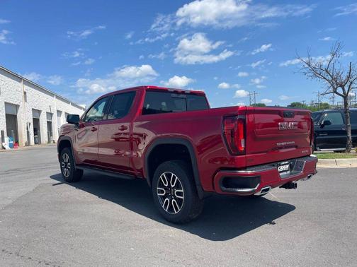 Volcanic Red Tintcoat 2026 GMC Sierra 1500 AT4