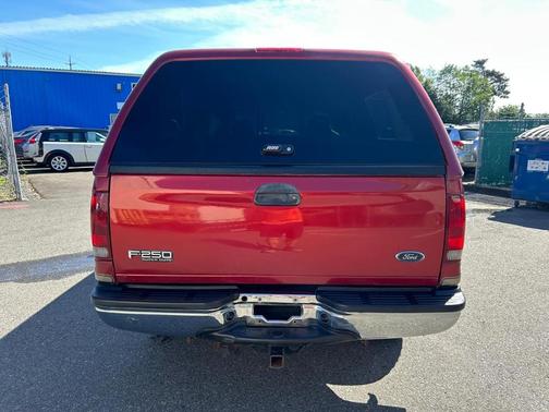 Red 2003 Ford F-250 King Ranch