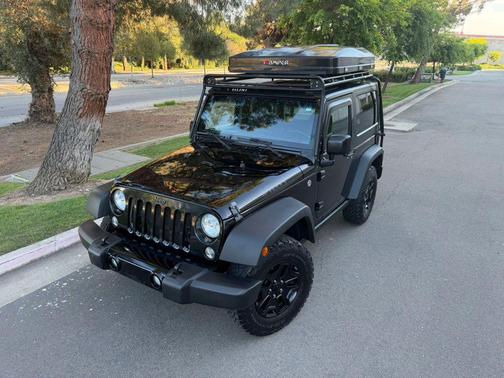 Black 2016 Jeep Wrangler Sport