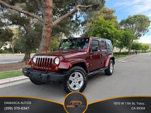 Red 2007 Jeep Wrangler Unlimited Sahara