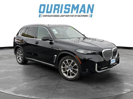 Black Sapphire Metallic 2024 BMW X5 PHEV xDrive50e