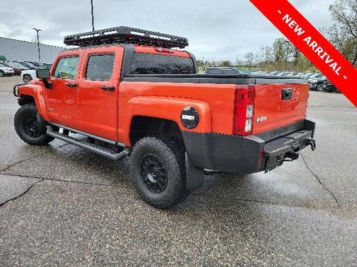Solar Flare Metallic 2009 Hummer H3T Adventure Edition