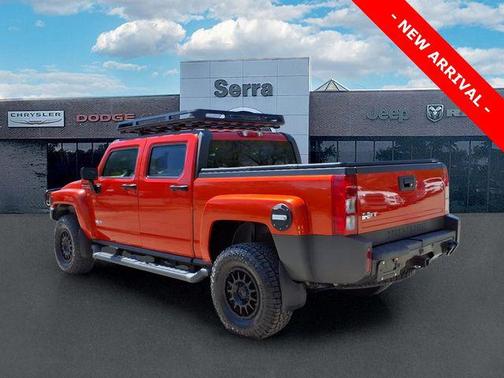 Solar Flare Metallic 2009 Hummer H3T Adventure Edition