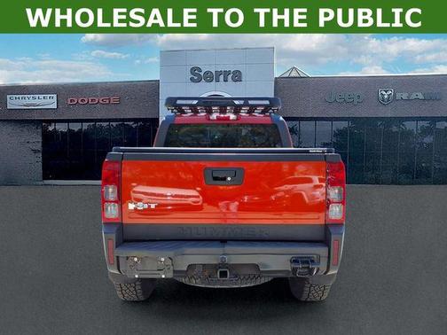 Solar Flare Metallic 2009 Hummer H3T Adventure Edition