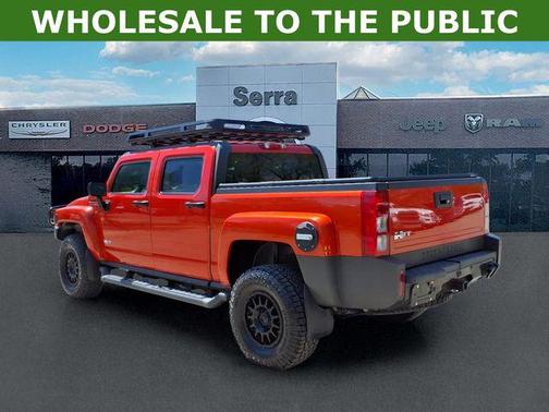 Solar Flare Metallic 2009 Hummer H3T Adventure Edition