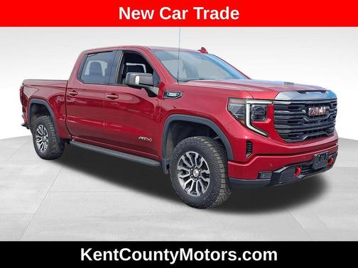Volcanic Red Tintcoat 2023 GMC Sierra 1500 AT4
