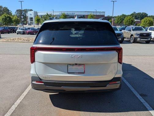 Ivory Silver 2025 Kia Carnival SX Prestige