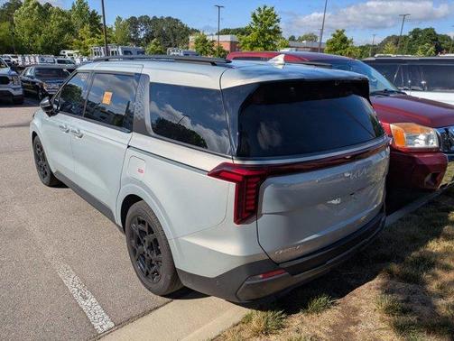 Ivory Silver 2025 Kia Carnival SX Prestige