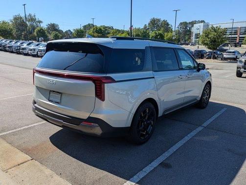Ivory Silver 2025 Kia Carnival SX Prestige