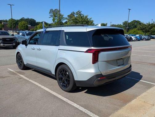 Ivory Silver 2025 Kia Carnival SX Prestige