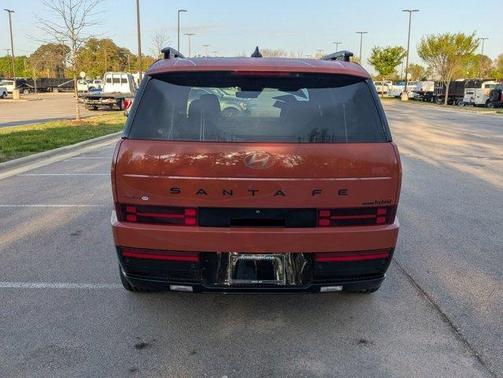 Orange 2025 Hyundai SANTA FE HEV Calligraphy