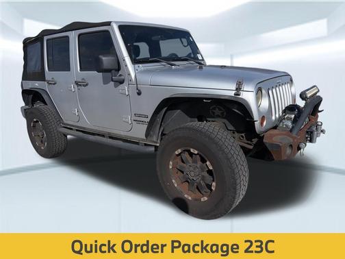 Bright Silver Metallic Clearcoat 2012 Jeep Wrangler Unlimited Sport
