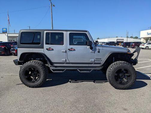 Photo 3 of 29 of 2015 Jeep Wrangler Unlimited Sport