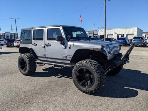 Photo 1 of 29 of 2015 Jeep Wrangler Unlimited Sport