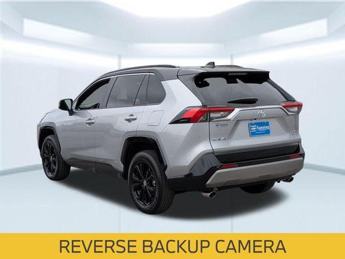 Silver Sky Metallic/Midnight Black Metallic 2025 Toyota RAV4 Hybrid SE