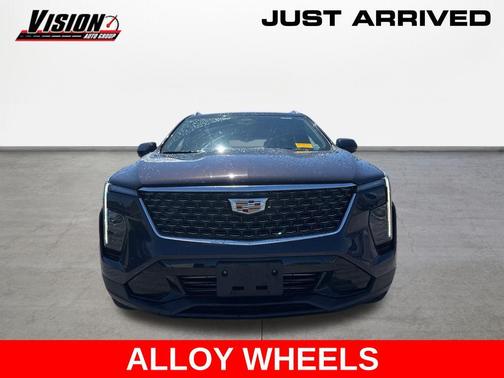 Midnight Sky Metallic 2024 Cadillac XT4 Premium Luxury