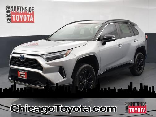 Silver Sky Metallic/Midnight Black Metallic 2023 Toyota RAV4 Hybrid SE