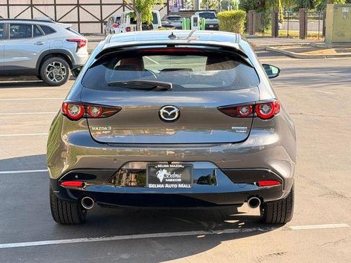 Machine Gray Metallic 2026 Mazda Mazda3 AWD w/Premium Package