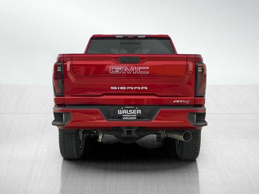Volcanic Red Tintcoat 2026 GMC Sierra 3500 AT4