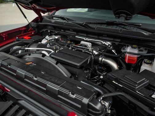 Volcanic Red Tintcoat 2026 GMC Sierra 3500 AT4
