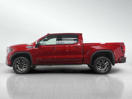 Volcanic Red Tintcoat 2025 GMC Sierra 1500 AT4