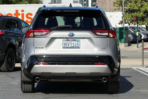 Silver Sky Metallic/Midnight Black Metallic 2023 Toyota RAV4 Hybrid SE