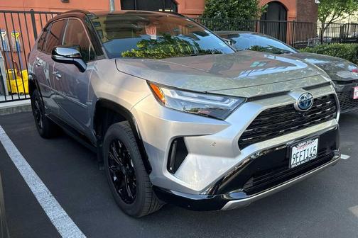 Silver Sky Metallic/Midnight Black Metallic 2023 Toyota RAV4 Hybrid SE