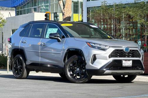 Silver Sky Metallic/Midnight Black Metallic 2023 Toyota RAV4 Hybrid SE