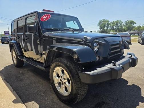 Black 2013 Jeep Wrangler Unlimited Sahara