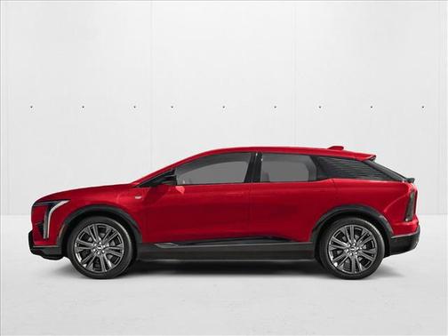 Radiant Red Tintcoat 2026 Cadillac OPTIQ Premium Sport