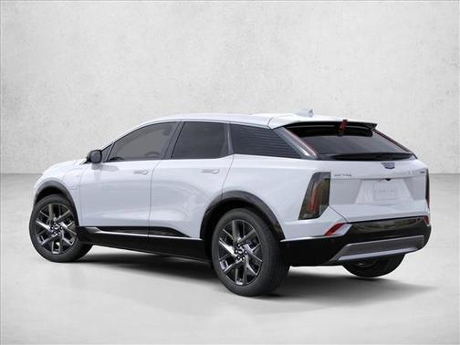 Vibrant White Tricoat 2026 Cadillac OPTIQ Premium Luxury
