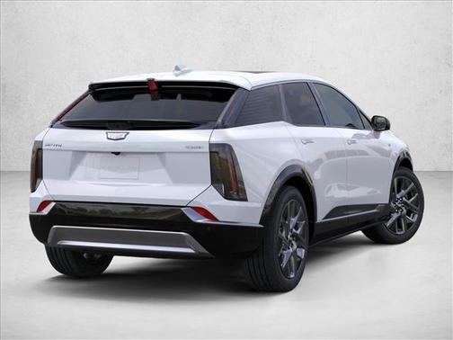 Vibrant White Tricoat 2026 Cadillac OPTIQ Premium Luxury